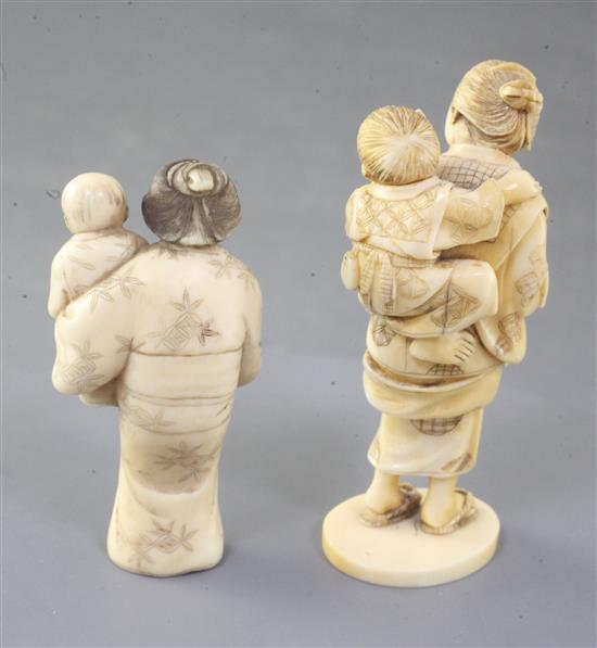 Two small Japanese ivory okimono of a mother and child, 19th century, height 6.4 and 7.9cm